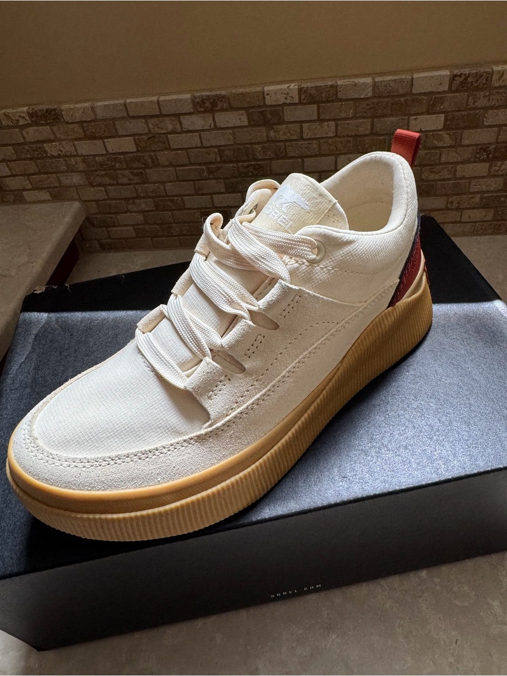 Sorel Cream Canvas Sneakers with Tan Sole and Red Heel Tab